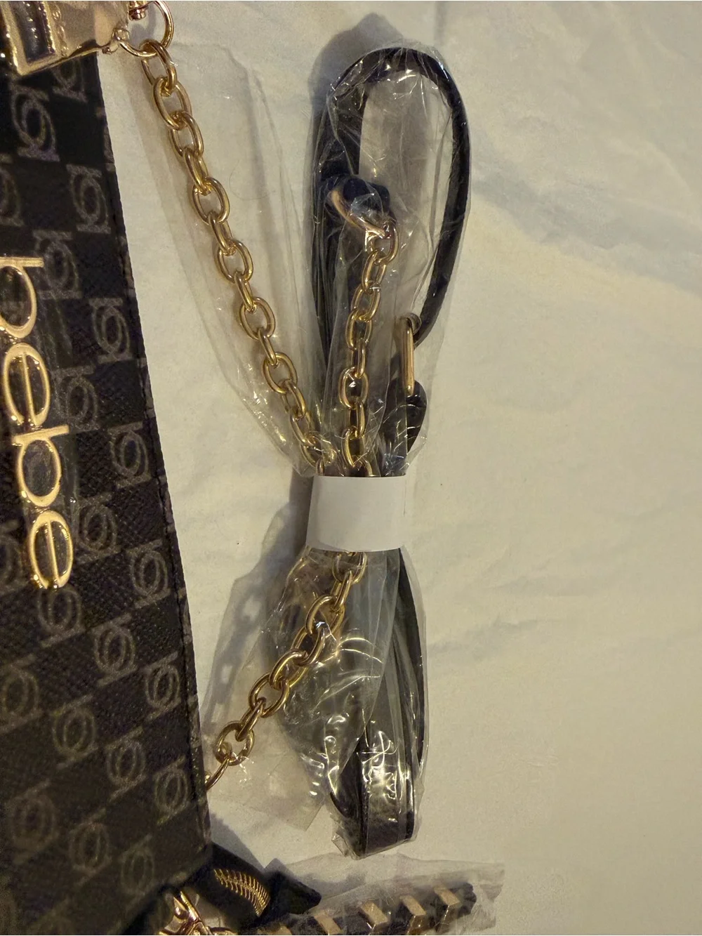 bebe Black and Gray Logo Wristlet with Gold Chain